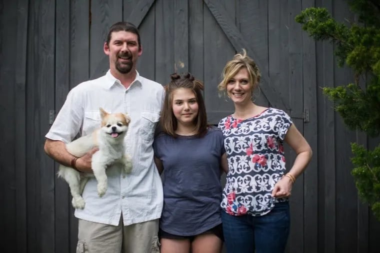 Emily Whitehead, shown with parents Tom and Kari Whitehead, was the first child treated with a groundbreaking immunotherapy for leukemia. She had a severe reaction, went into a coma and recovered only after getting a drug that suppressed the immune response. Today, she is cancer-free.