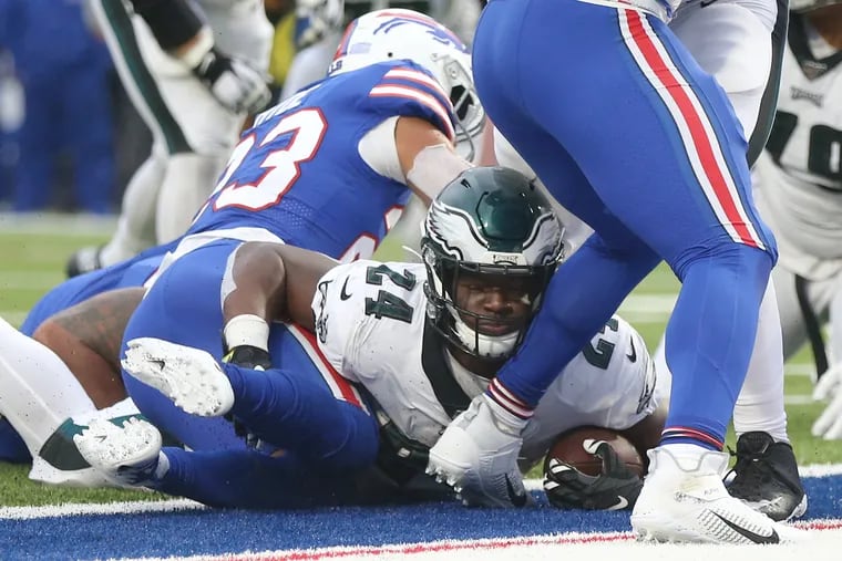 Eagles running back Jordan Howard (24) scores a touchdown against the Bills in October.