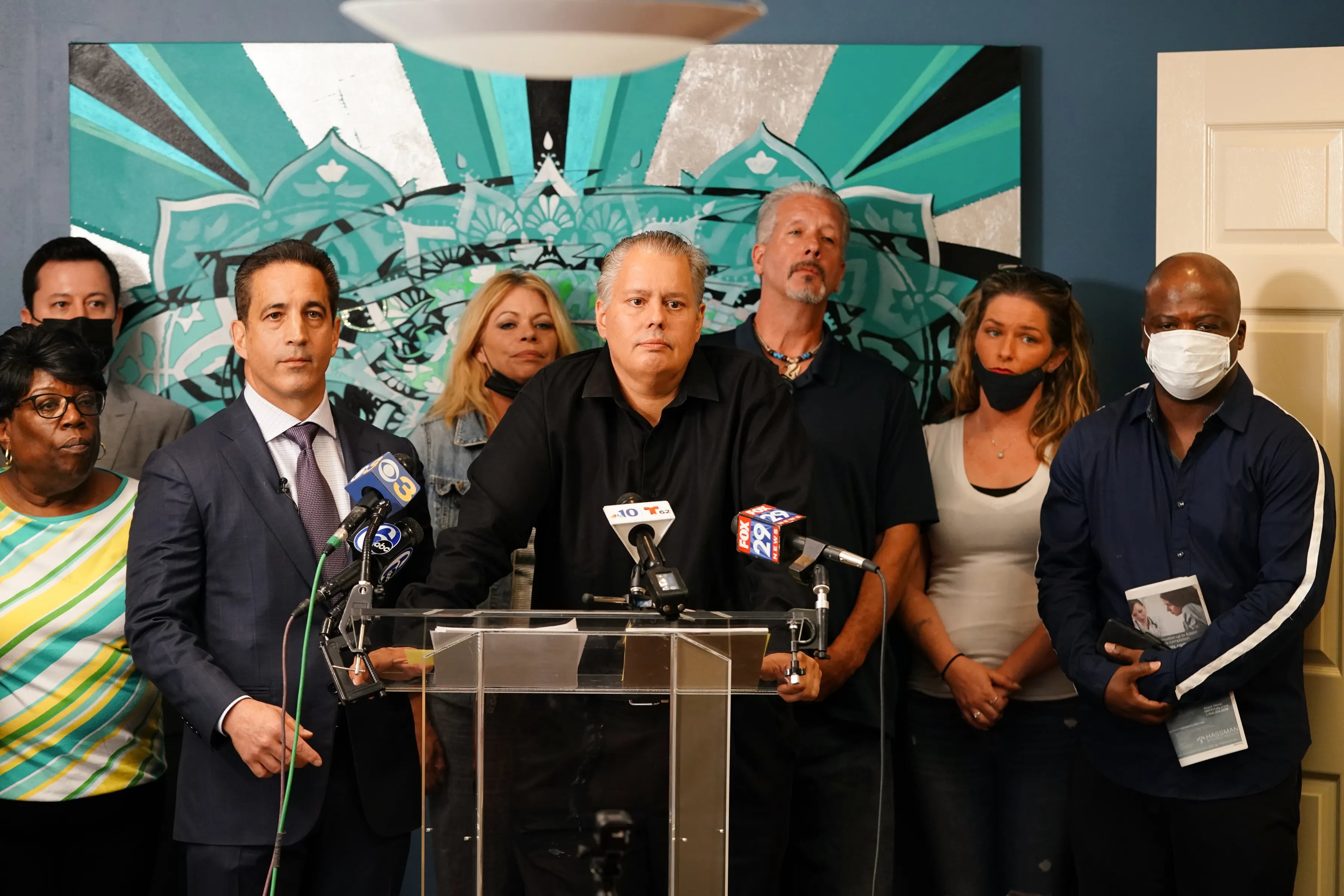 Walter Ogrod (center) speaks surrounded by his lawyer Joseph Marrone (left) and supporters during a news conference to announce a civil lawsuit against the City of Philadelphia.