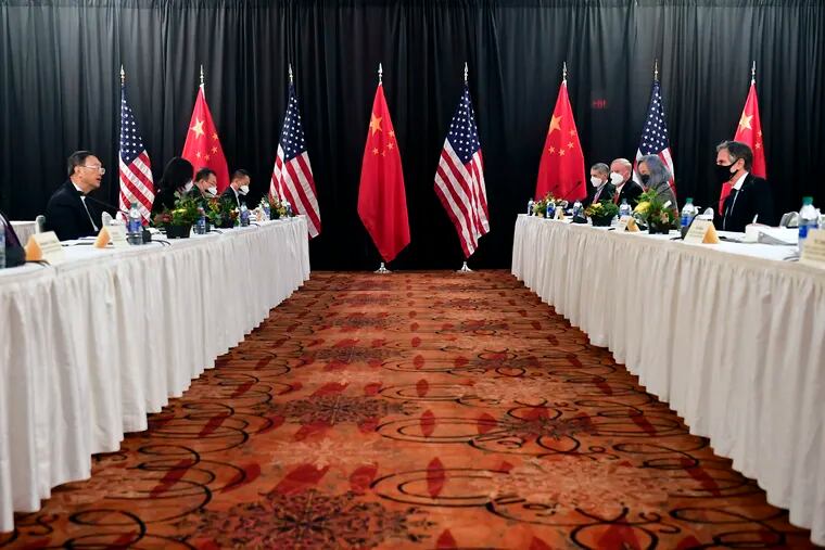 Secretary of State Antony Blinken, second from right, joined by national security adviser Jake Sullivan, right, speaks while facing Chinese Communist Party foreign affairs chief Yang Jiechi, second from left, and China's State Councilor Wang Yi, left, at the opening session of U.S.-China talks at the Captain Cook Hotel in Anchorage, Alaska. China said Friday, March 19, 2021, a “strong smell of gunpowder and drama” resulted from talks with top American diplomats in Alaska, continuing the contentious tone of the first face-to-face meetings under the Biden administration.