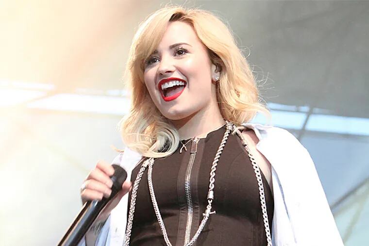 Singer Demi Lovato at Penn's Landing in 2013.. She credits her boyfriend for her sobriety. (Steven M. Falk / Staff Photographer)