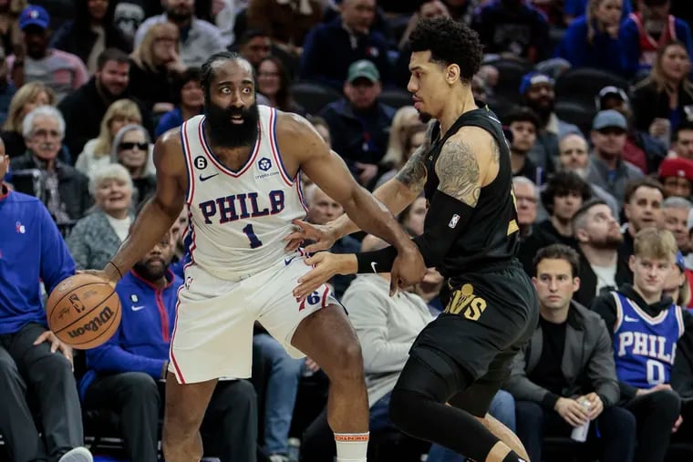 Sixers guard James Harden drives on Cavaliers guard Danny Green.