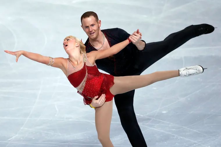 FILE - In this Nov. 15, 2013, file photo, Caydee Denney and John Coughlin, of the United States, perform during their Pairs Short Program during the ISU Figure Skating Eric Bompard Trophy at Bercy arena in Paris. Coughlin, a two-time U.S. pairs champion recently suspended from figure skating, has died. He was 33.   U.S. Figure Skating released a statement Saturday, Jan. 19, 2019, and cited his sister, Angela Laune. The sister said in a Facebook post that her "wonderful, strong, amazingly compassionate brother John Coughlin took his own life. ... I have no words." There were no further details. (AP Photo/Francois Mori, File)