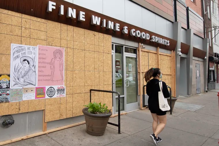 The Fine Wine & Good Spirits on South Street. Pennsylvania liquor stores are to reopen for curbside pickup Monday.