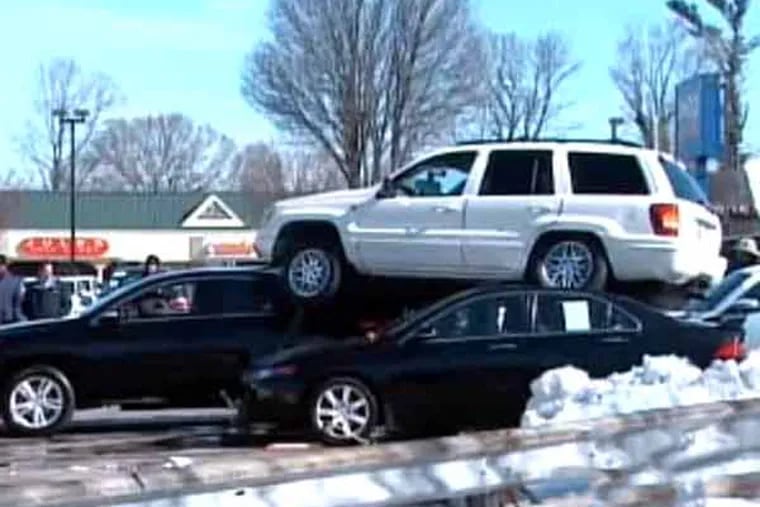 Investigation underway into an unusual crash at a car dealership in Ardmore.