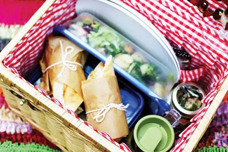 A wicker basket is the traditional picnic carrier with each food item packed separately in jars and lidded containers. (Regina H. Boone/Detroit Free Press/MCT)