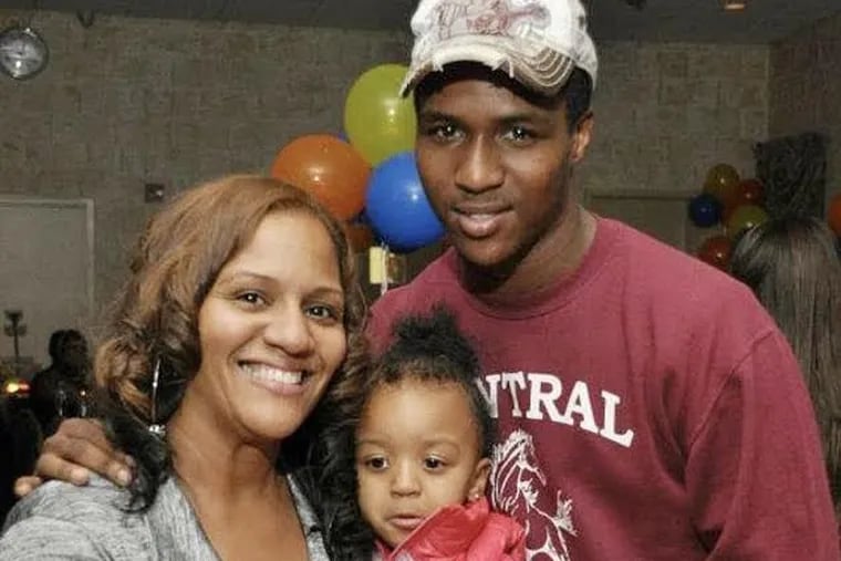 Brandon Dixon, right, with his mother and daughter.