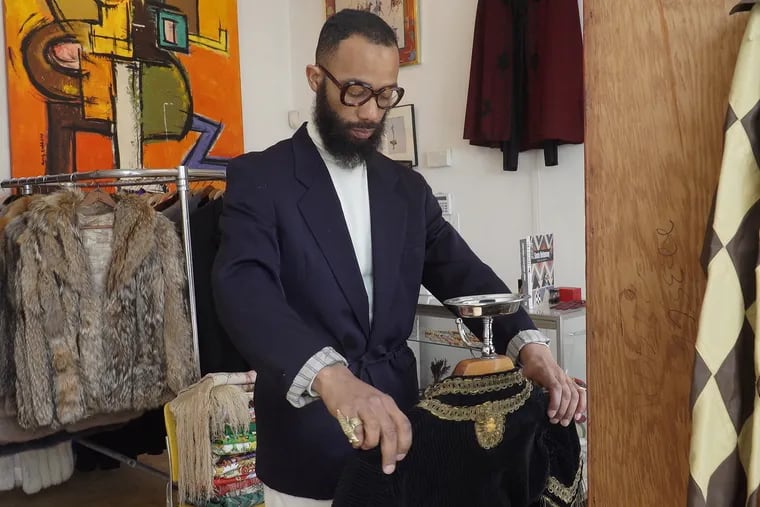 Erik Honesty curates and styles clothes from as early as the 1920s at his vintage menswear store in Germantown.