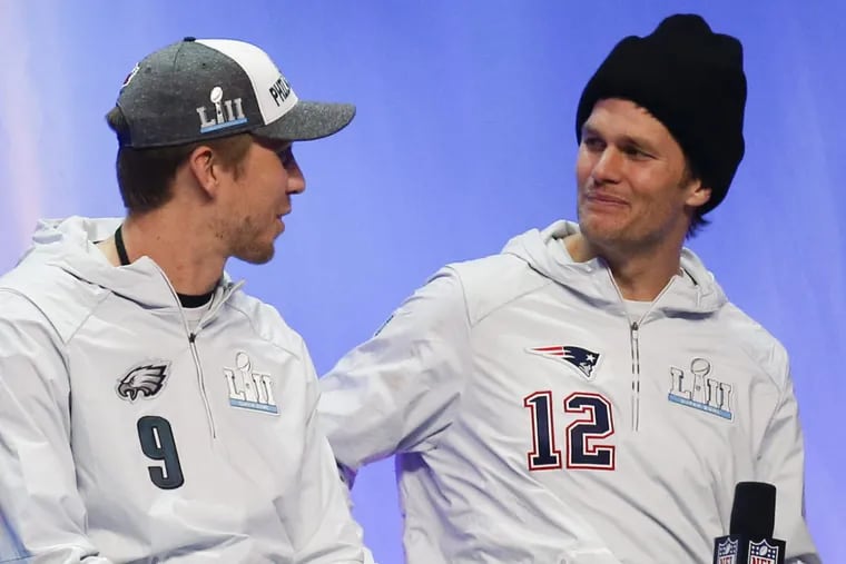 The Eagles and Nick Foles (left) are facing one of the greatest quarterbacks ever in Tom Brady (right) on Sunday.