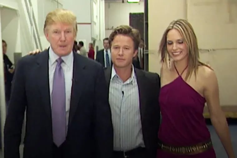 Donald Trump shown with then "Access Hollywood" co-host Billy Bush (center) and actress Arianne Zucker on the set of "Days of Our Lives" in 2005. Trump was caught in a crude conversation with Bush about Zucker and other women on the bus ride to the set.