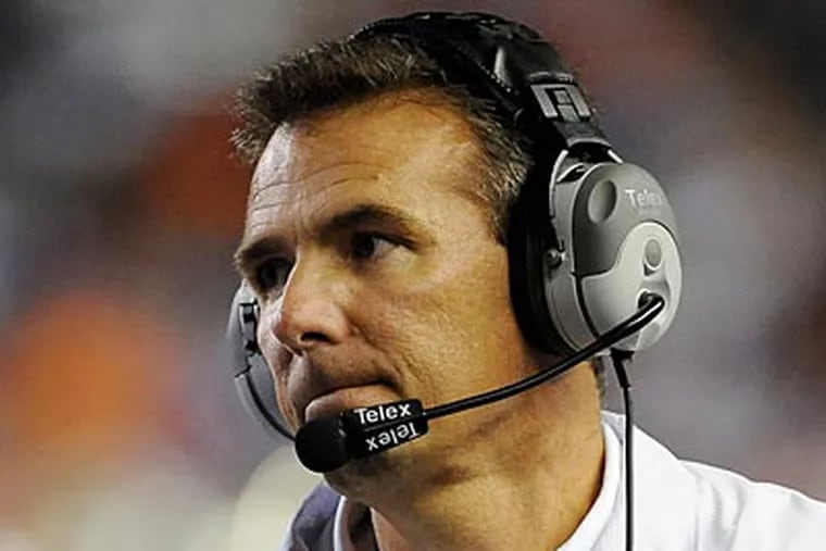 Former Florida coach Urban Meyer is likely to be the leading candidate to replace Joe Paterno. (Phil Sandlin/AP File Photo)