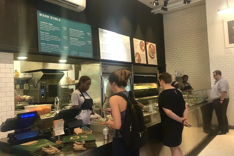 Customers stand in line at Sweetgreen in Center City, Philadelphia on Wednesday, Oct. 2.