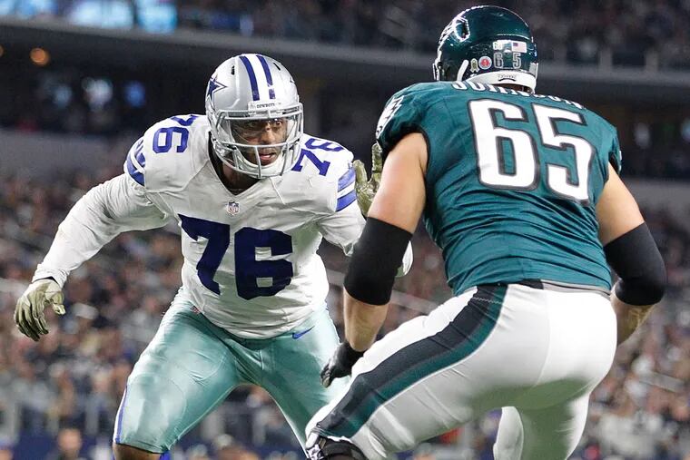 Dallas Cowboys defensive end Greg Hardy (76) rushes the passer against Philadelphia Eagles tackle Lane Johnson (65) in the third quarterat AT&T Stadium.