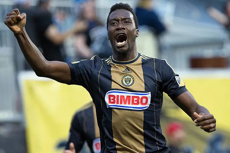 Philadelphia Union forward C.J. Sapong (17) celebrates his goal against the Columbus Crew during the first half at PPL Park. (Bill Streicher/USA Today)