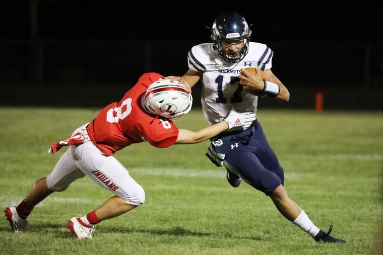 Quarterback Austin Leyman threw for a touchdown pass in St. Augustine's 34-0 win over Rancocas Valley as the Hermits stayed undefeated.