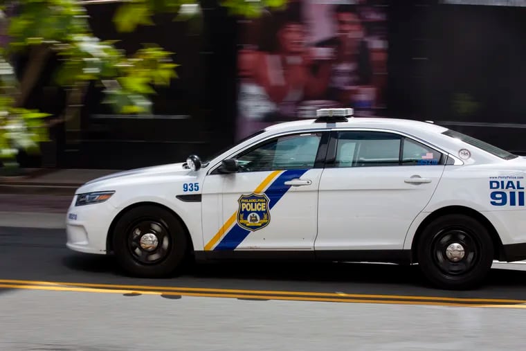 Philadelphia Police Department Car drives by in Center City Philadelphia on Sunday, Sept. 8, 2019.
