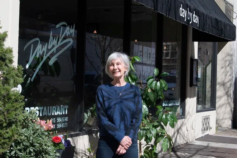 Day by Day owner Robin Barg in front of her restaurant on March 30, 2021, as the restaurant reopened after a shutdown.