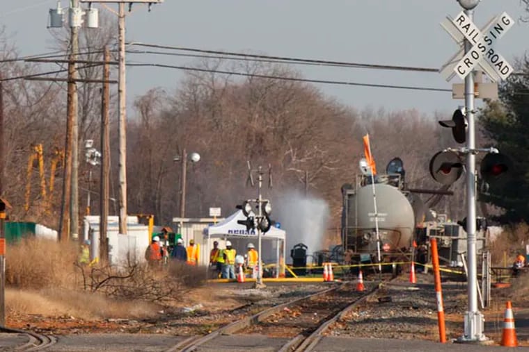 The blocks surrounding Paulsboro train wreck were evacuated and public schools were closed today due to spiking levels of vinyl chloride readings in the area. The accident which happened Friday has displaced hundreds of residents. ( RYAN S. GREENBERG / Staff Photographer )