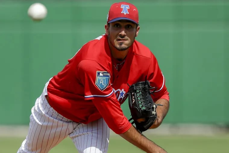 Phillies starting pitcher Zach Eflin throws a fourth-inning warm-up pitch against the New York Yankees during a spring training game at Spectrum Field in Clearwater, FL on Thursday, March 1, 2018.