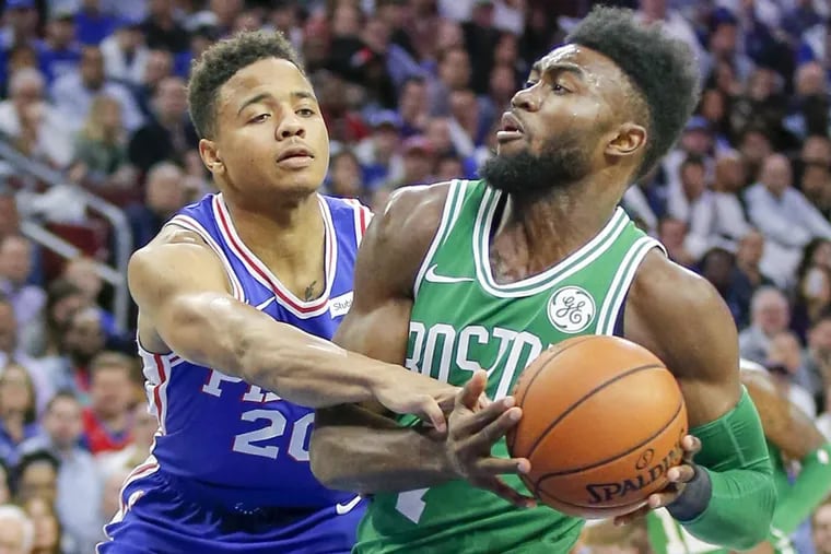 Sixers guard Markelle Fultz fouls Boston Celtics forward Jaylen Brown during the second quarter on Friday.