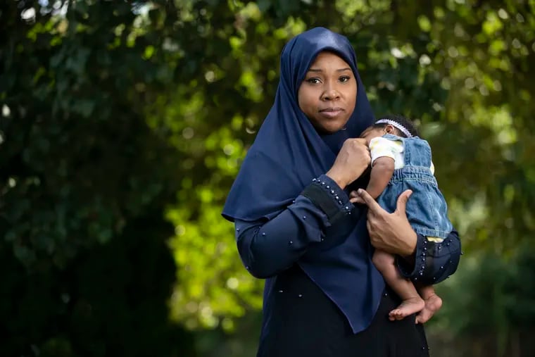 Sherell Robinson posed for portrait with her two month old daughter Illiyin Robinson, near her home in Philadelphia, Pa. Robinson has been getting treatment for postpartum depression over the past two months.