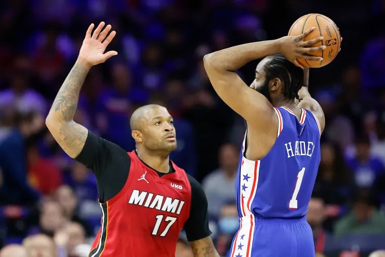 Miami Heat forward P.J. Tucker defending Sixers guard James Harden during Game 6 of their playoff series on May 12.