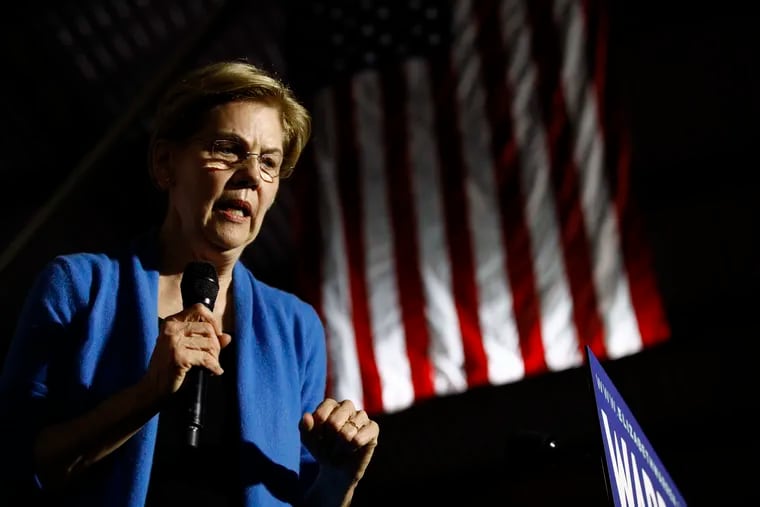 In this March 3, 2020 photo, Democratic presidential candidate Sen. Elizabeth Warren (D., Mass.) speaks during a primary election night rally, at Eastern Market in Detroit.