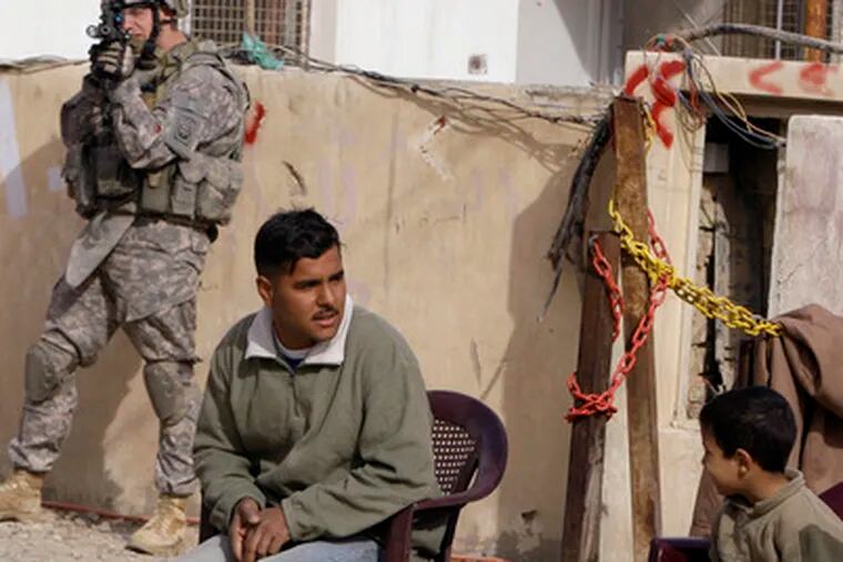 A U.S. soldier in Baghdad. A top U.S. general says troops will stay on to address any violence after January&#0039;s elections.