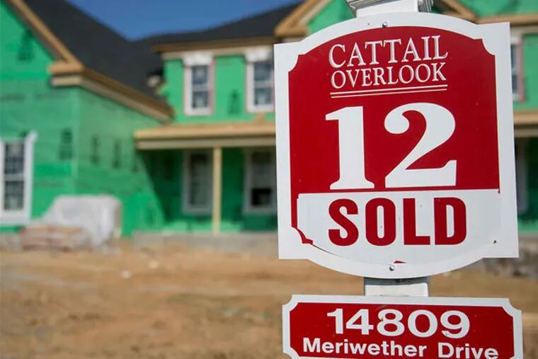 A &quot;sold&quot; sign at a house under construction earlier this year at the Toll Bros. Inc. Cattail Overlook development in Glenelg, Md. ANDREW HARRER / Bloomberg News