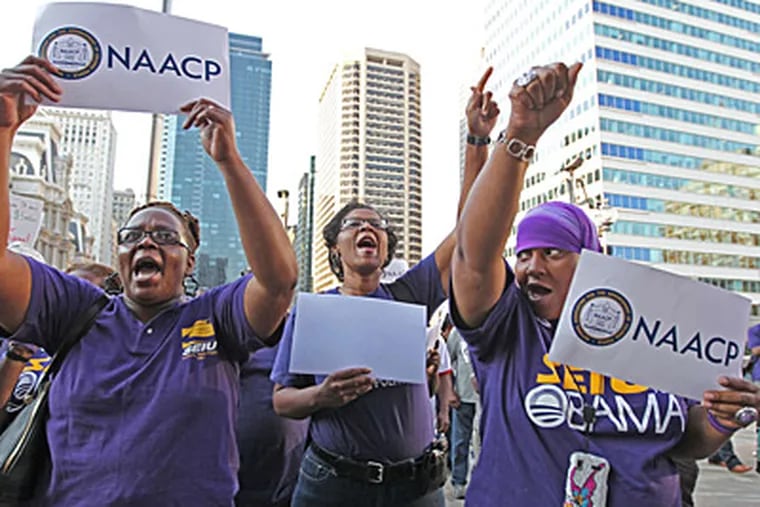 Union members (from left) Denise Sharper, Jacqueline Coles, and Karmella Sams at a rally Thursday across from City Hall, where the state Supreme Court met. (MICHAEL BRYANT / Staff)