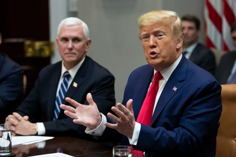 President Donald Trump with Vice President Mike Pence, speaks during a coronavirus briefing with Airline CEOs in the Roosevelt Room of the White House, Wednesday, March 4, 2020, in Washington. (AP Photo/Manuel Balce Ceneta)