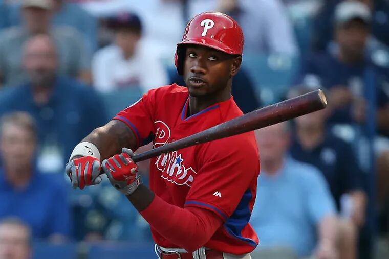 Domonic Brown will remain at Triple A Lehigh Valley to work on his mechanics. (David Maialetti / Staff Photographer)