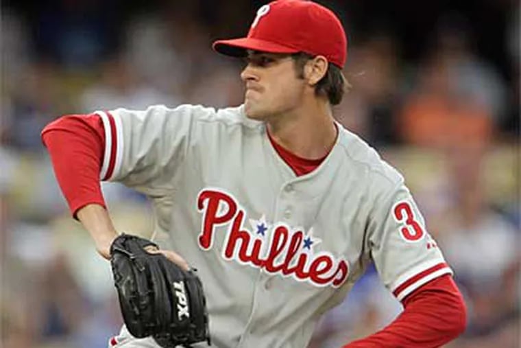 "I should be ready, and by not being ready I'm jeopardizing the team," said Phillies ace Cole Hamels. (Yong Kim / File photo)