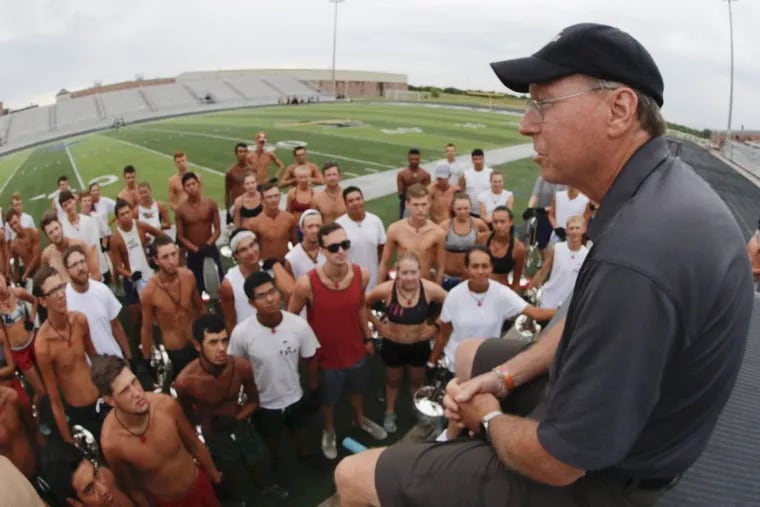 Fred Morrison, executive director of Crossmen drum corps of San Antonio, Texas talks to the horn line early Monday July 24, 2017 at Forney High School in Forney, Texas.
