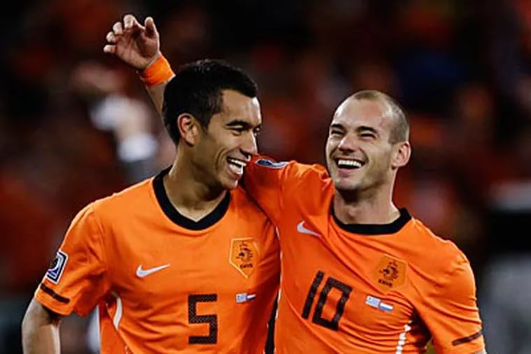 The Netherlands will play Spain in Sunday's World Cup final. (AP Photo / Julie Jacobson)