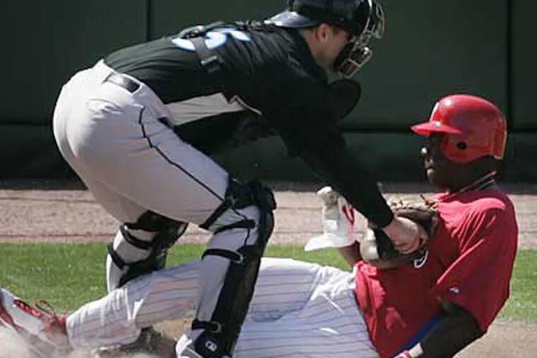 The Phillies acquired John Mayberry Jr., right, from the Rangers last season. (Eric Mencher / Staff Photographer)