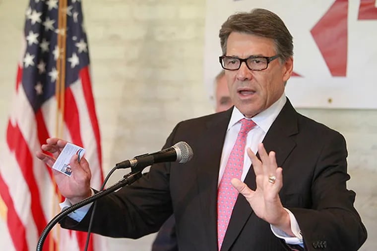 Texas Gov. Rick Perry (pictured) and a US Senate hopeful Steve Lonegan held a town-hall meeting at the Smithville Inn in Smithville, NJ on Tuesday, October 1, 2013. (AKIRA SUWA  /  Staff Photographer)