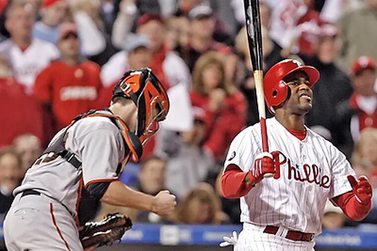 Jimmy Rollins strikes out in the eighth inning of Game 1 of the NLCS. (Ron Cortes / Staff Photographer)