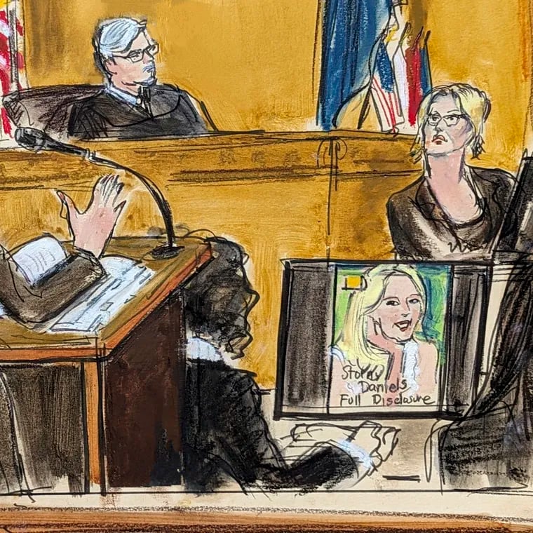 In this courtroom sketch, defense attorney Susan Necheles, center, cross examines Stormy Daniels, far right, whose real name is Stephanie Clifford, as former President Donald Trump, left, looks on with Judge Juan Merchan presiding during Trump's trial in Manhattan criminal court on Tuesday in New York.