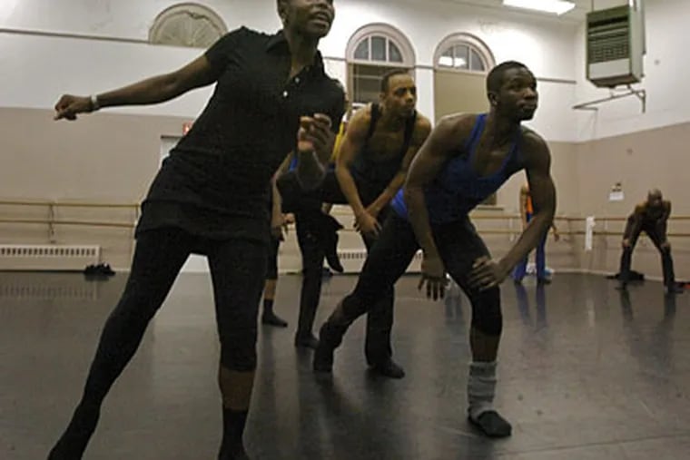 Choreographer and former company member Hope Boykin, left, sets a new piece on Philadanco. (John Costello / Staff Photographer)