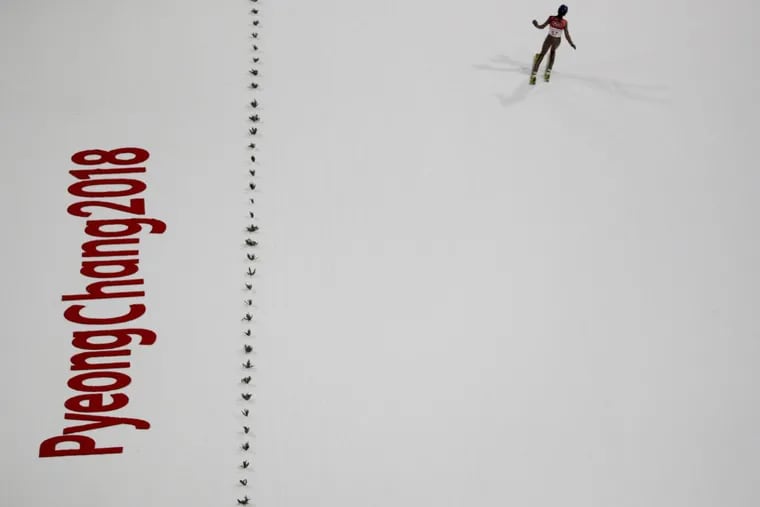 Kamil Stoch, of Poland, finishes his jump during the men’s normal hill individual ski jumping trial round for qualification ahead of the 2018 Winter Olympics in Pyeongchang, South Korea, Thursday, Feb. 8, 2018.