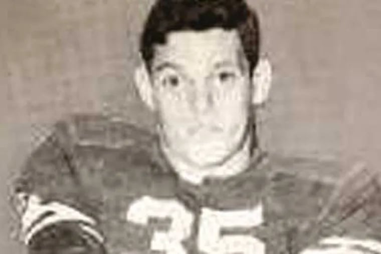 Martin C. Qualtieri in his Northeast Catholic football uniform in 1956.