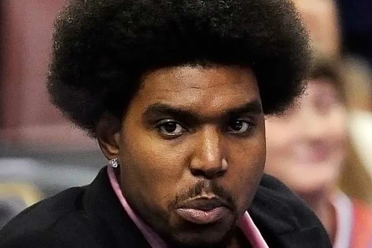 Andrew Bynum has yet to play for the 76ers since being traded from the Lakers. (Michael Perez/AP)