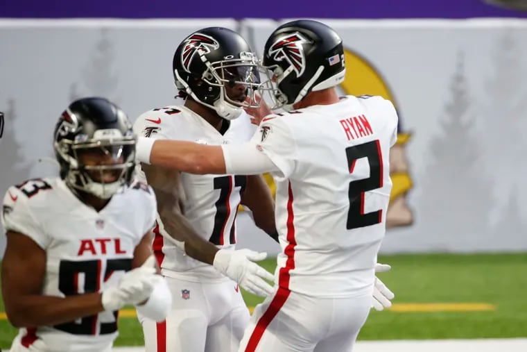 Julio Jones (center) celebrated with Matt Ryan (2) after catching a touchdown pass in Week 6 against Minnesota. Jones has 16 receptions over the last two games for Atlanta, which plays at Carolina tonight.