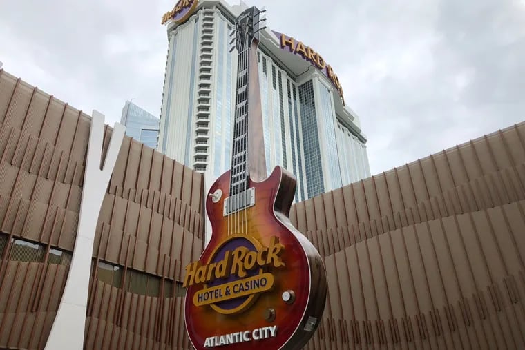 The Hard Rock Hotel & Casino on June 27, 2018, toward a planned June 28 opening. It is located on the site of the the former Taj Mahal, which closed in 2016 after a labor dispute with billionaire owner Carl Icahn. The now-president Trump hailed the business as the Eighth wonder of the world when it opened in 1990. Trump's name was removed from the property shortly after his 2017 inauguration, according to a court filing, because Icahn failed to maintain the iconic and invaluable Trump Entertainment brand.