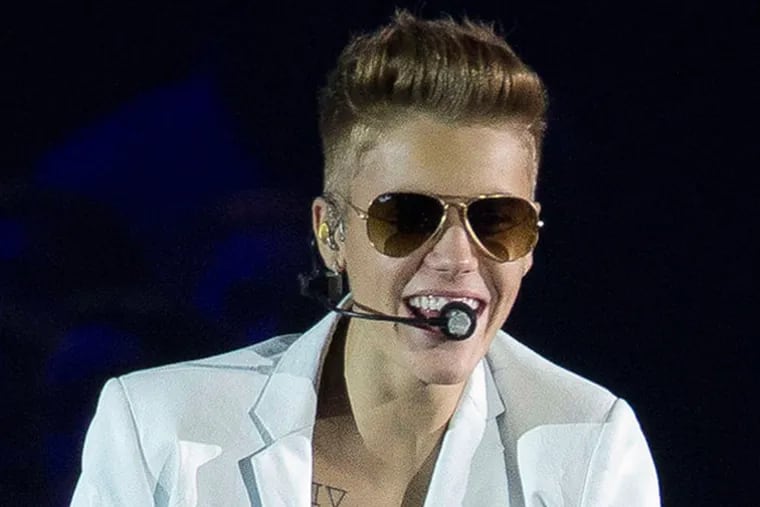 Justin Bieber's got his own ax to grind: He's peeved over reports he's checking into drug 'n' alcohol rehab.
