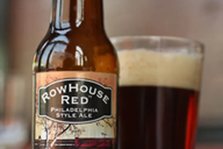 Two of the Philadelphia Brewing Co.&#0039;s four new beers - a bottle of Rowhouse Red and a pint of Walt Wit. The Kensington brewery, owned by Bill and Nancy Barton, began production this spring.