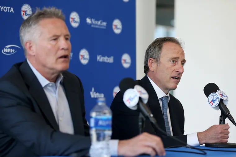 Sixers interim GM Brett Brown (left) and co-managing partner Josh Harris speak during a news conference discussing the resignation of Bryan Colangelo on Thursday at the team's facility it Camden, N.J. 