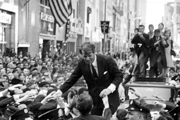 Robert F. Kennedy greeting a crowd at 15th and Chestnut during the 1968 campaign.