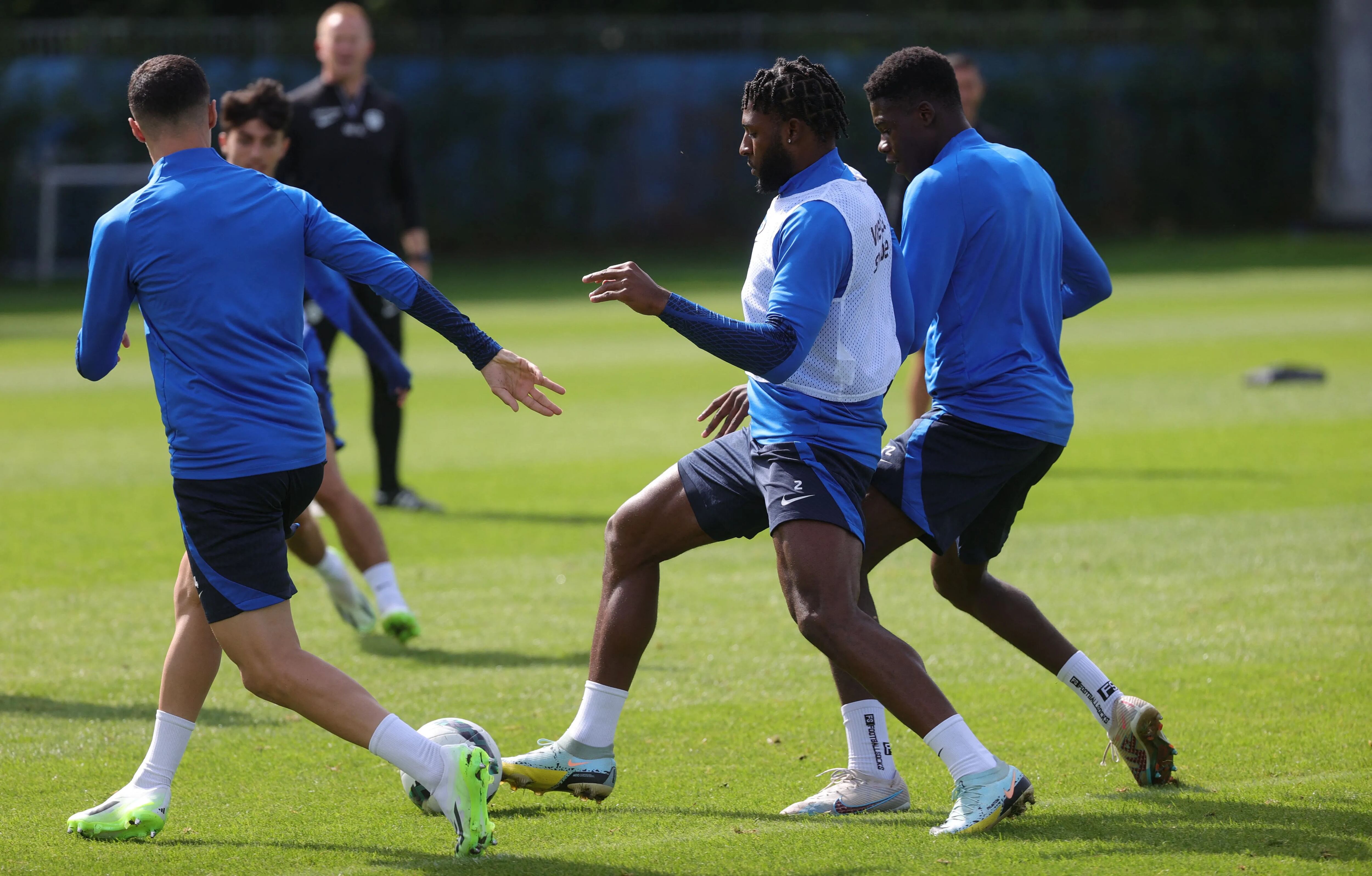 Mark McKenzie (center) working out in a practice with Genk earlier this month.